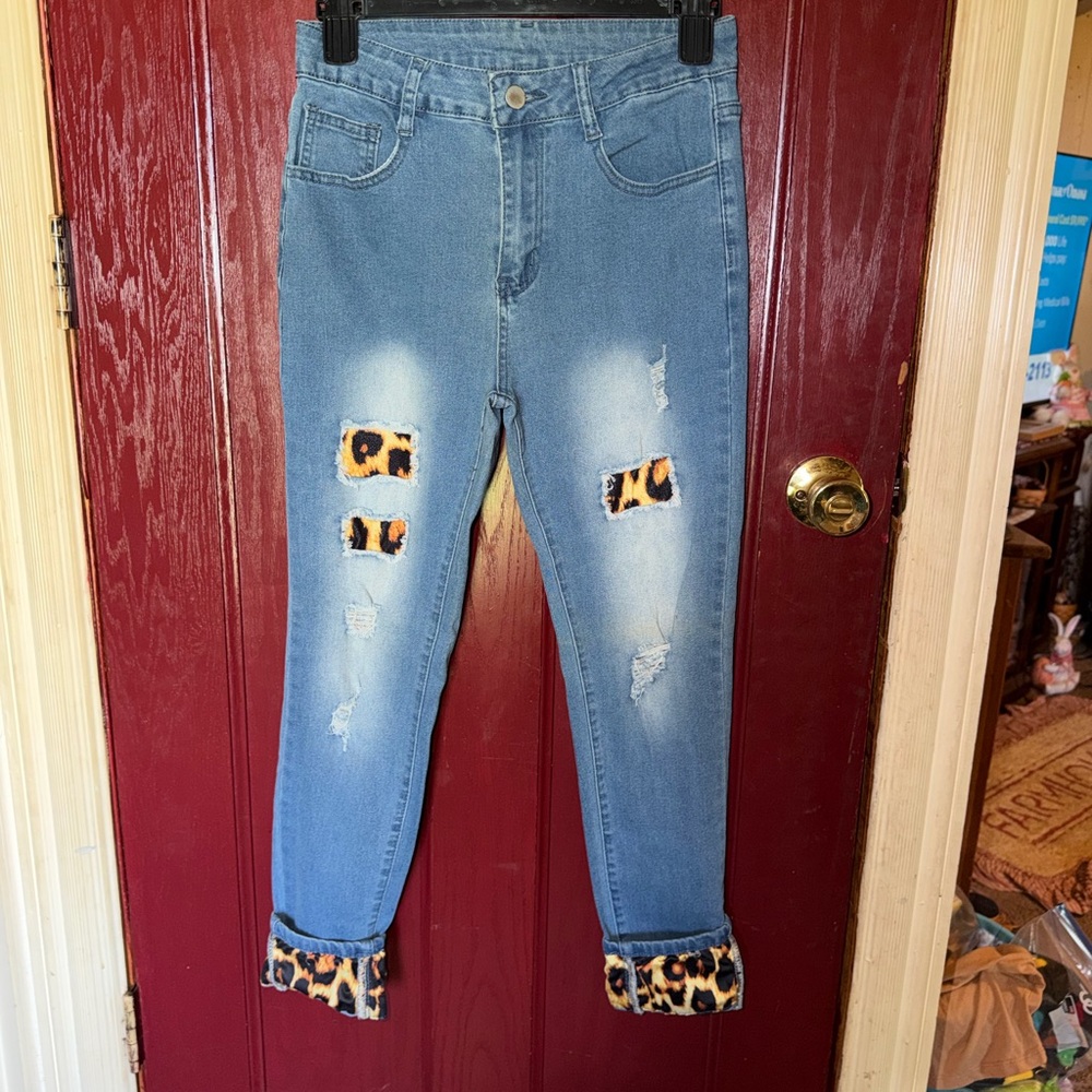Light Blue Distressed Jeans with Leopard Trim